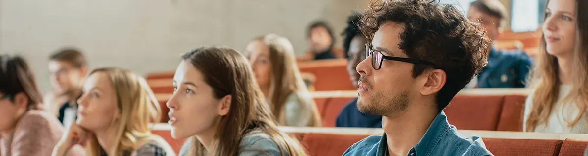 Rows of college students in class